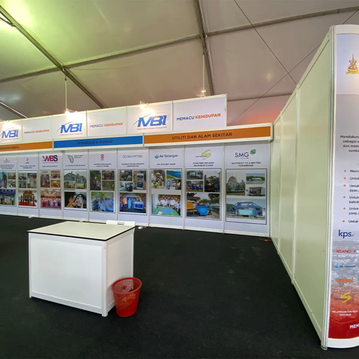 Branded system booth photographed from the aisle